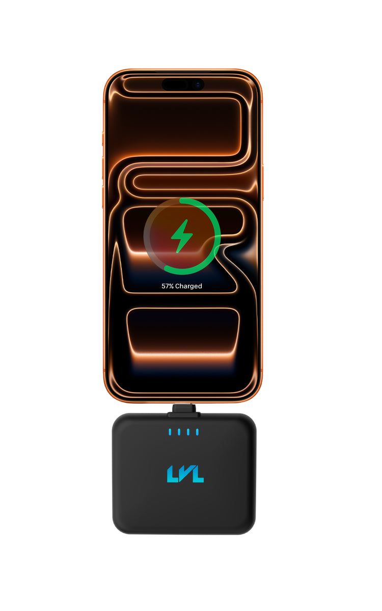 Wireless charging pad with smartphone on a white background