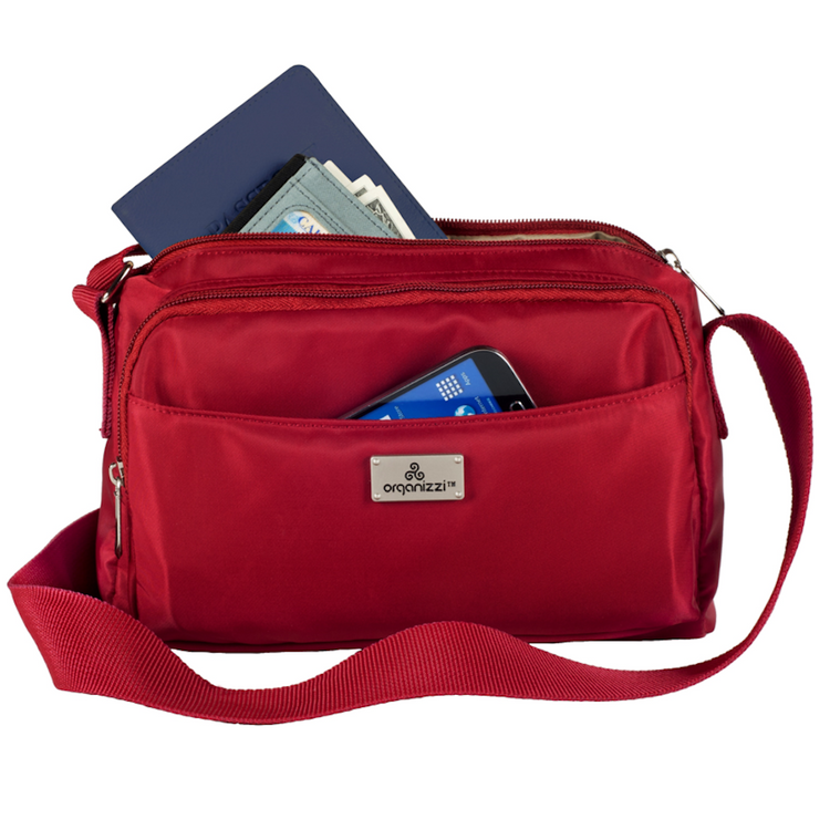 Red shoulder bag with a visible brand logo on a white background