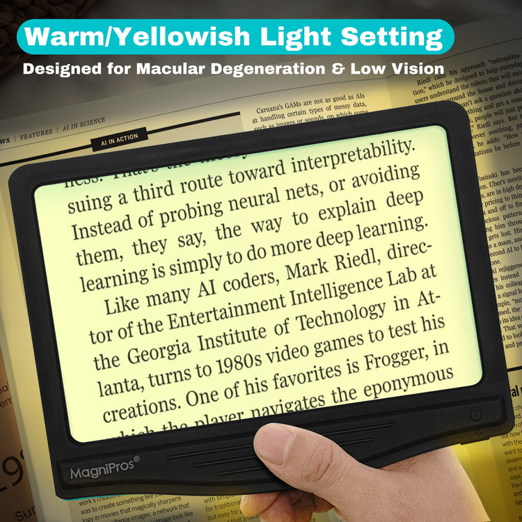 Hand holding a MagniPros device displaying text with a warm yellowish light setting, designed for macular degeneration and low vision.