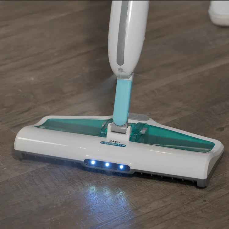 Mop cleaning a wooden floor with visible brand logo