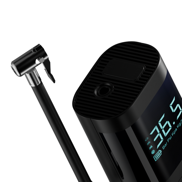 Black digital air pump with digital display on a white background
