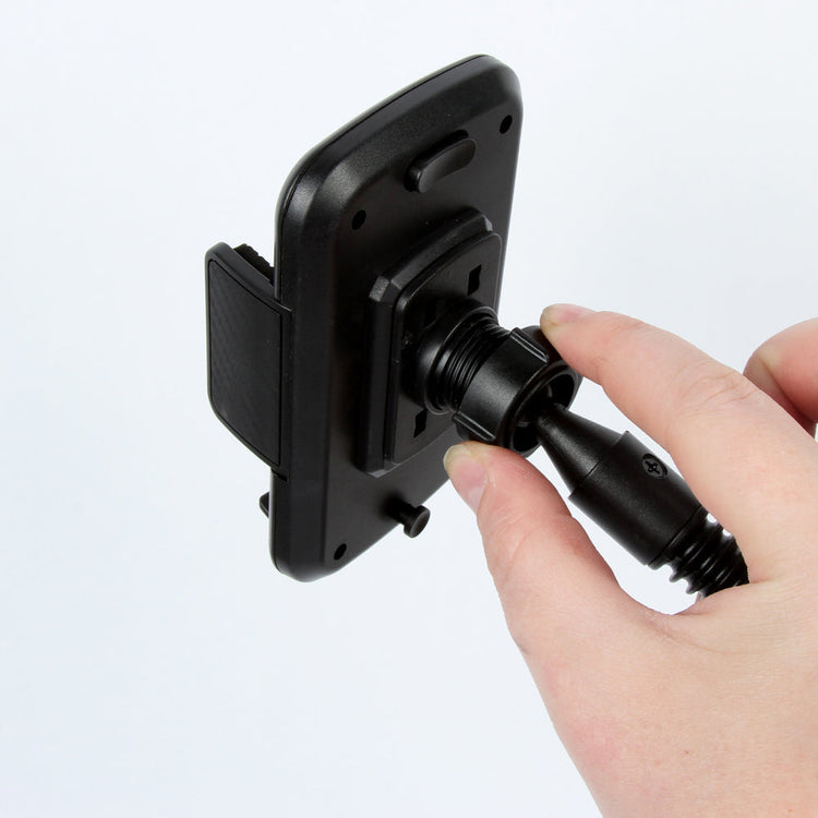 Hand adjusting a black phone mount on a white background