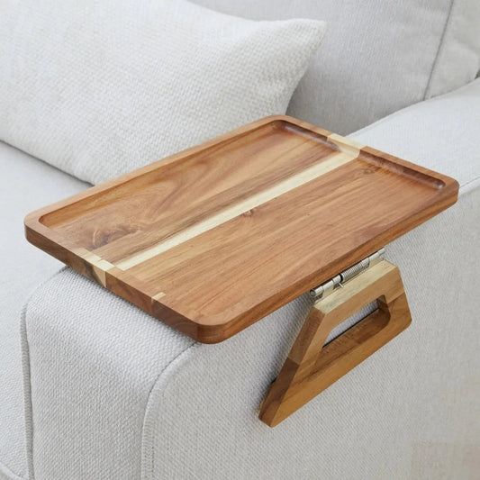 Wooden tray with stand on a light gray sofa