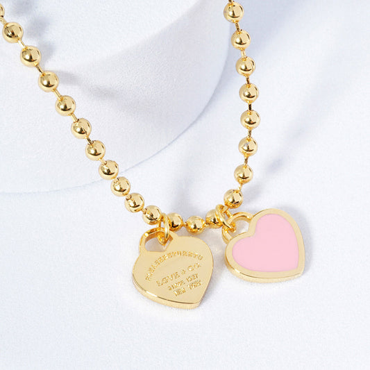 DOUBLE HEARTS ON BALL CHAIN - Gold