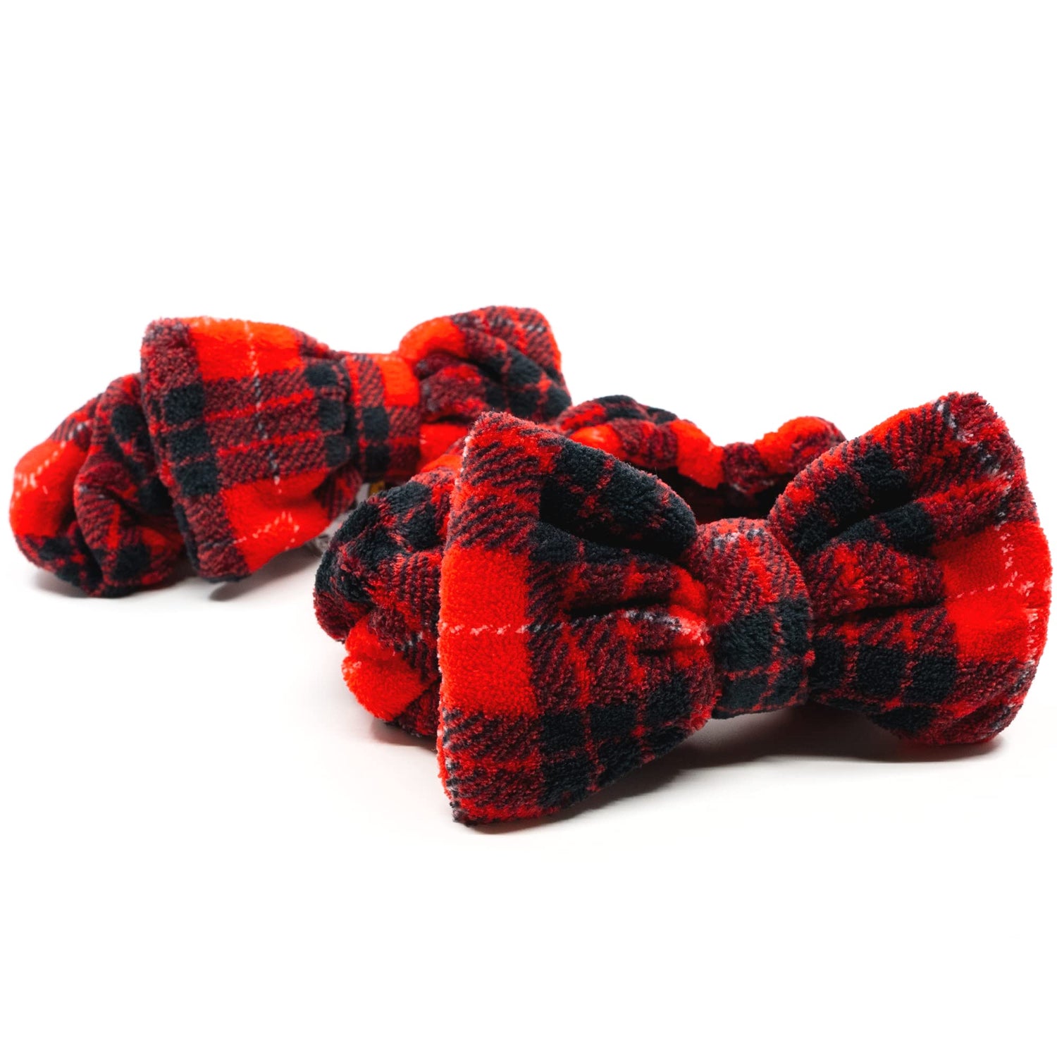 Red and black plaid bow tie on a white background