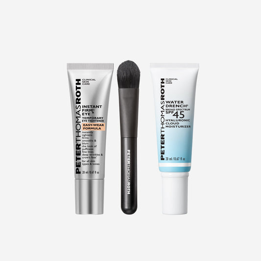 Two skincare products and a brush with Peter Thomas Roth branding on a white background