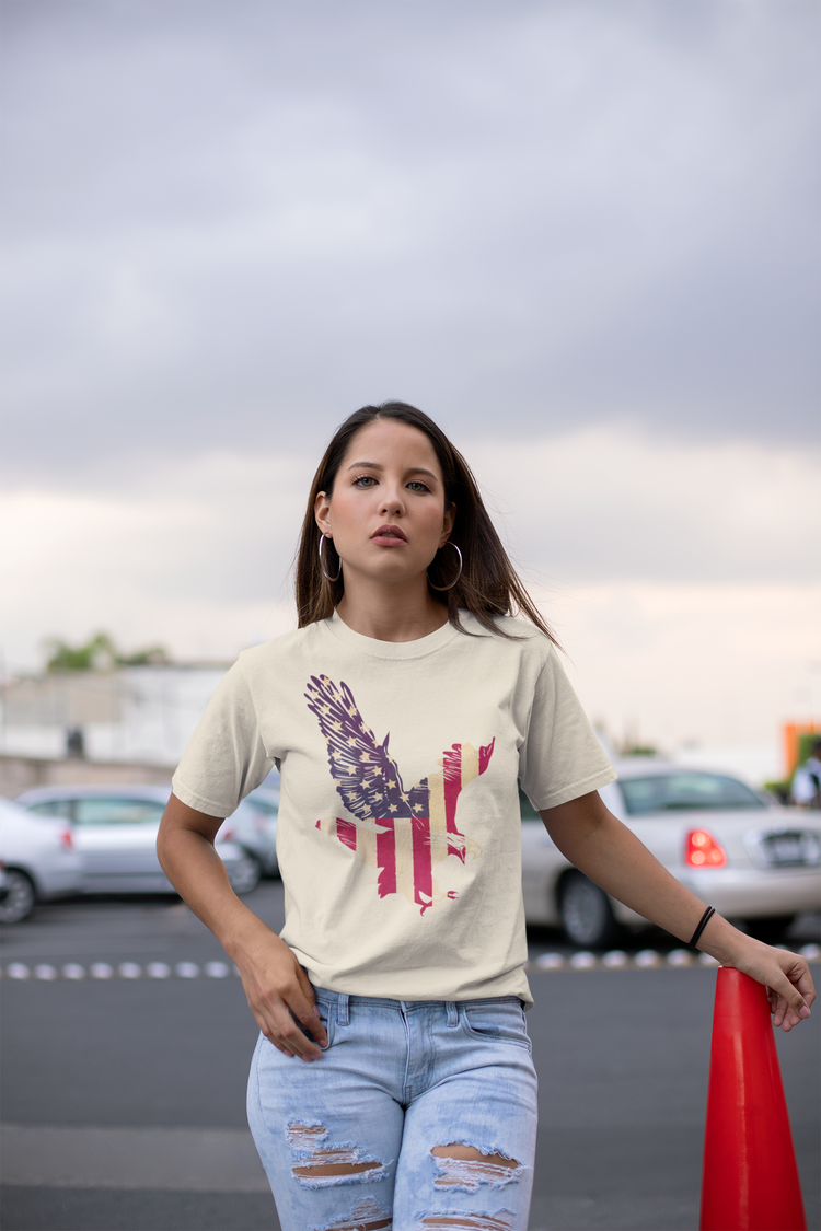 Woman wearing a t-shirt with a graphic design outdoors