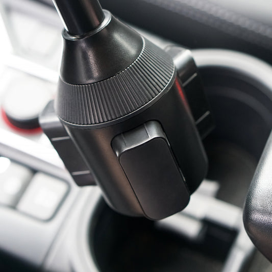 Black phone holder with cup holder on a white background
