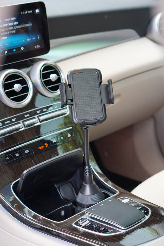 Black phone holder with cup holder on a white background