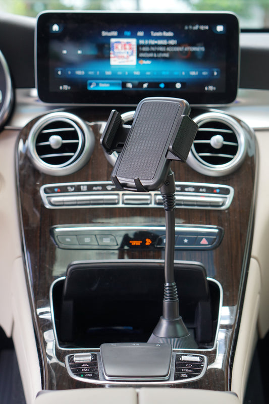 Black phone holder with cup holder on a white background