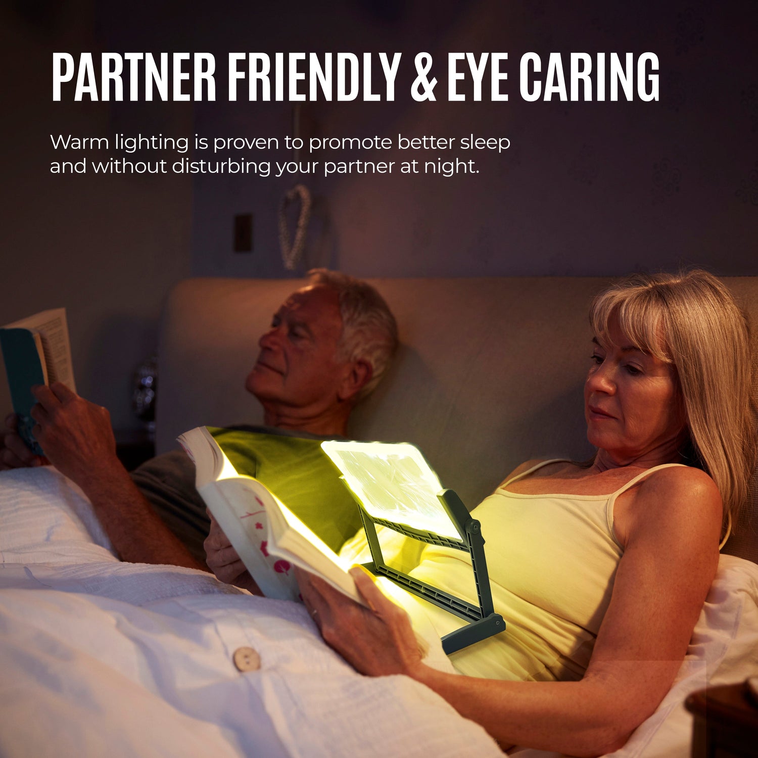Two people in bed, one using a booklight to read, with text about partner-friendly and eye-care lighting.