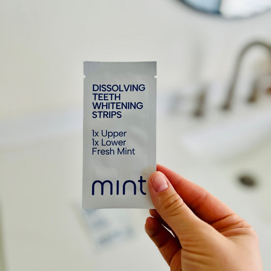 Box of Mint dental whitening strips on a white background
