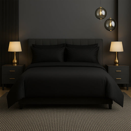 Neatly made bed with white bedding and pillows in a room with wooden nightstands and lamps.