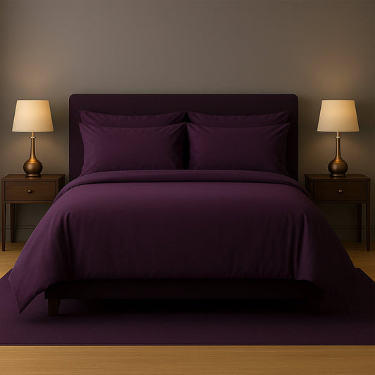 Neatly made bed with white bedding and pillows in a room with wooden nightstands and lamps.