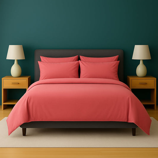 Neatly made bed with white bedding and pillows in a room with wooden nightstands and lamps.