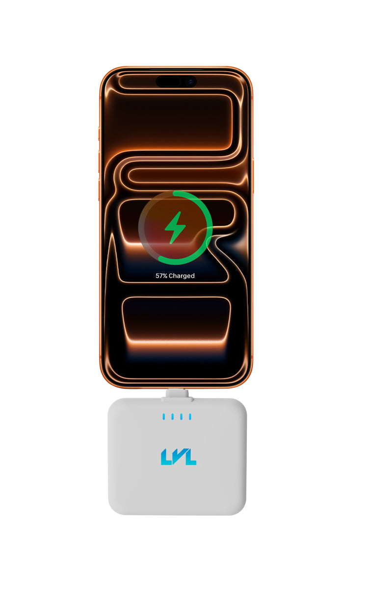 Wireless charging pad with smartphone on a white background