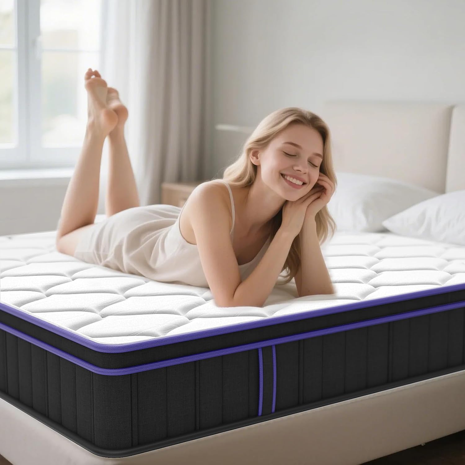 Woman lying on a mattress in a bedroom