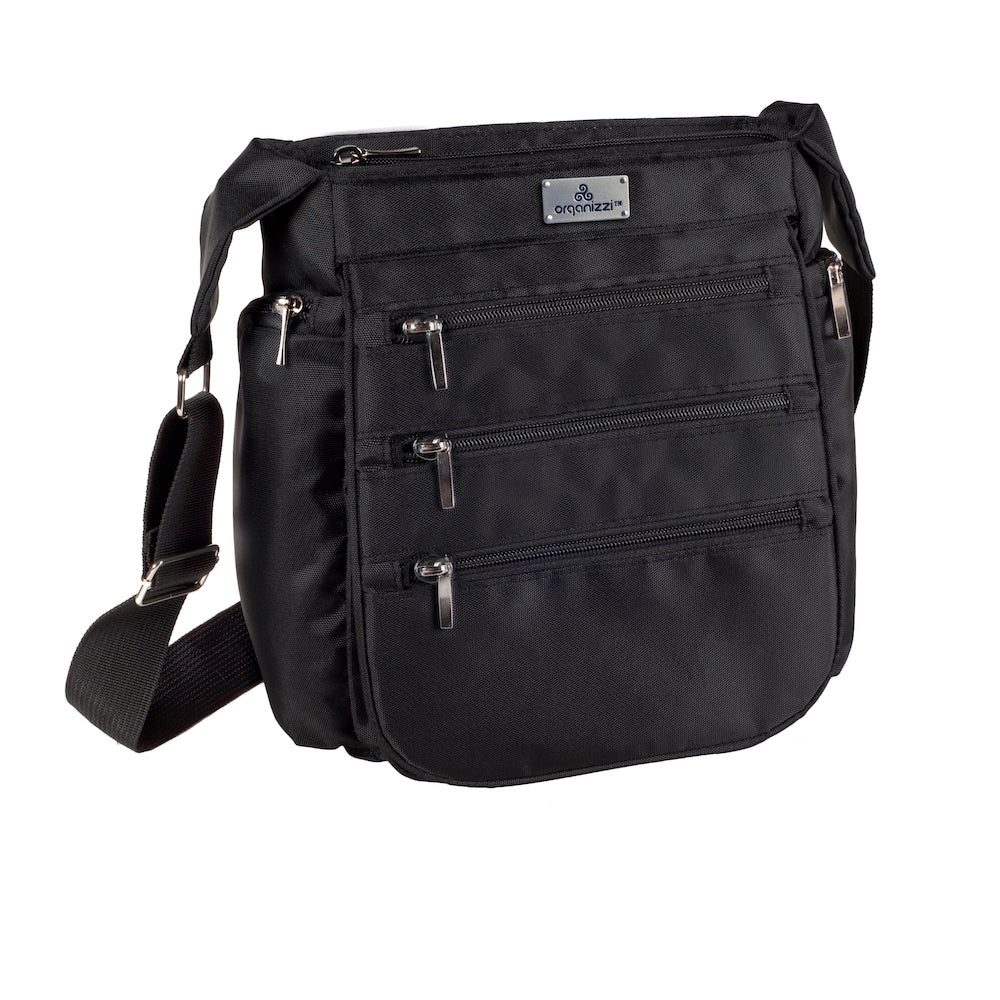 Black crossbody bag with multiple pockets on a white background