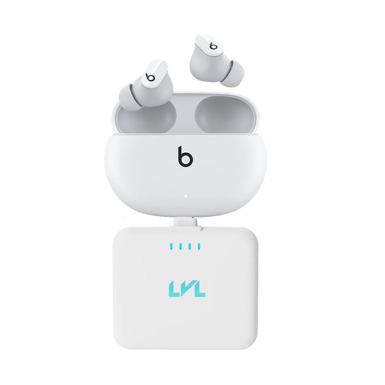 White wireless earbuds with charging case on a white background
