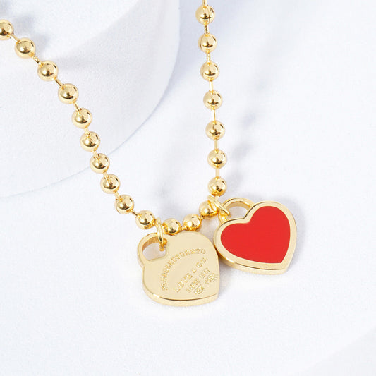 DOUBLE HEARTS ON BALL CHAIN - Gold