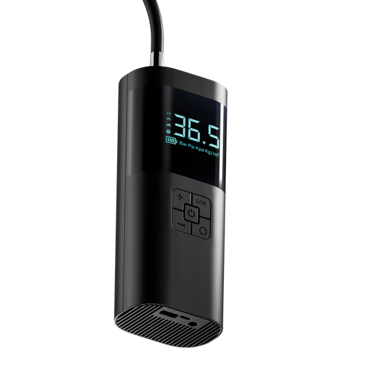 Black digital tire pressure monitor with digital display on a white background