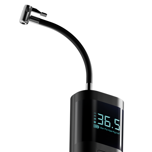 Black digital tire pressure monitor with digital display on a white background