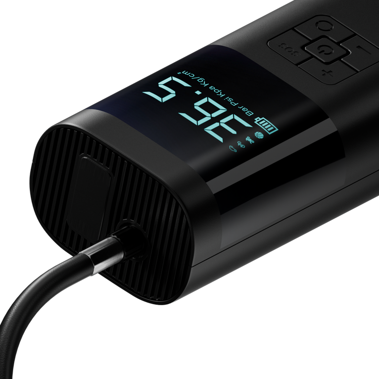 Black electronic device with digital display on a white background