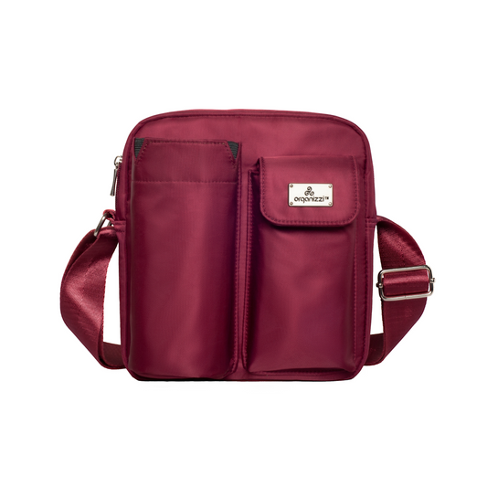 Maroon crossbody bag with a visible brand logo on a white background